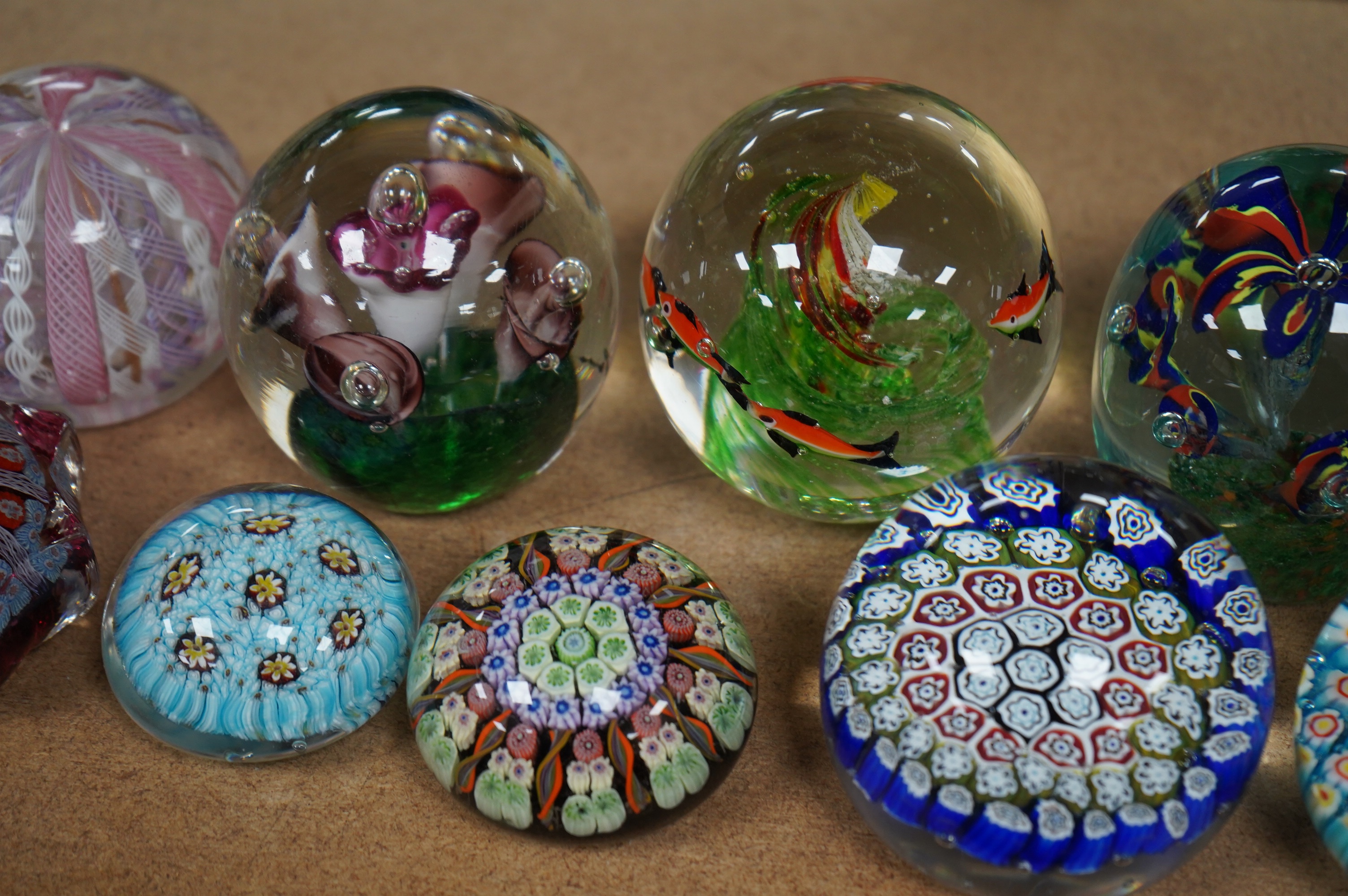 A group of ten paperweights including a ‘scent bottle’ paperweight, 9.5cm. Condition - fair to good